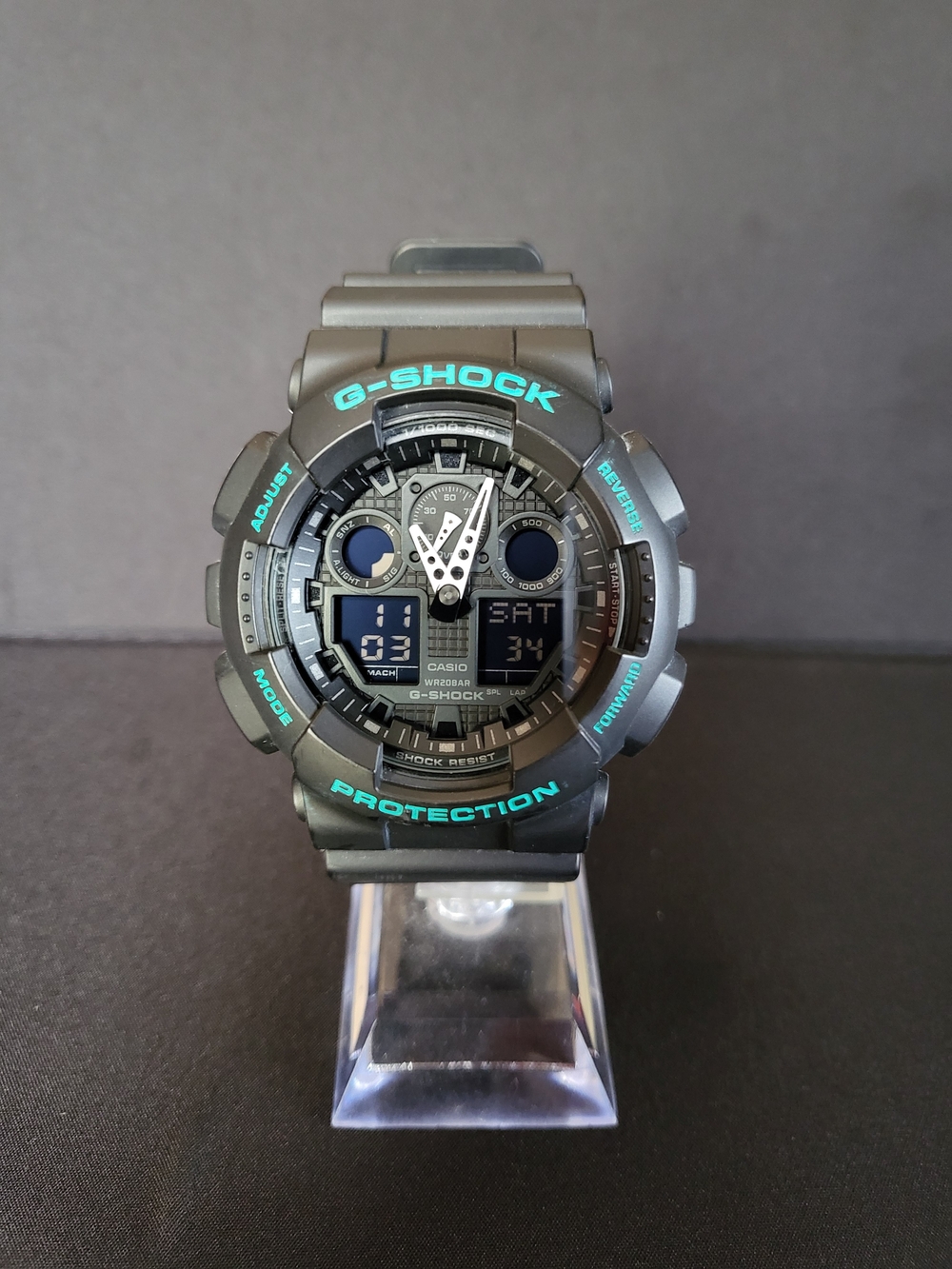 Casio G-Shock GA-100 black Watch with Teal Accents